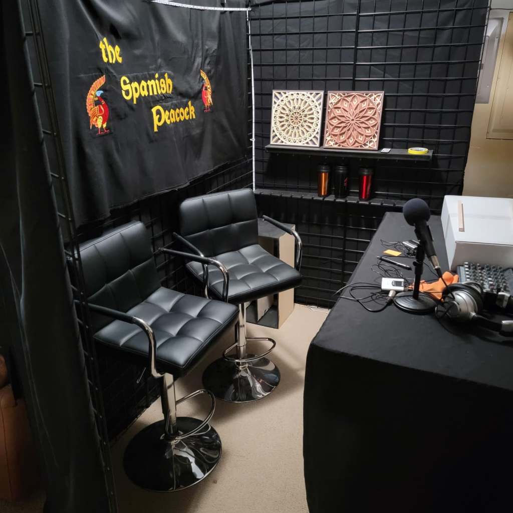 The Spanish Peacock virtual booth in a crammed corner of our basement